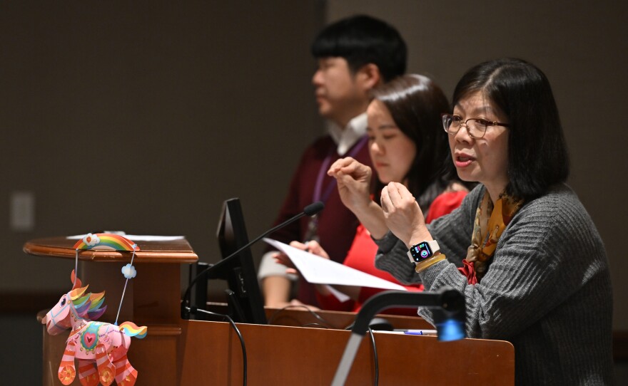 Dr. Ann Pang-White addresses a group at the University of Scranton about Lunar New Year and the significance of the year of the horse.