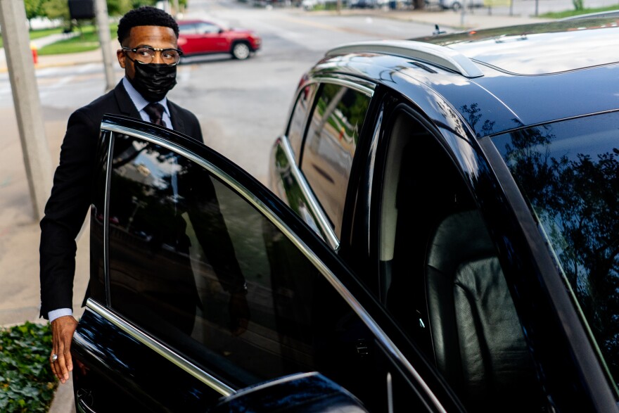 John Collins-Muhammad, former St. Louis Alderman, looks to the media after pleading guilty to federal corruption charges on Tuesday, Aug. 23, 2022, outside of the Thomas F. Eagleton Courthouse in downtown St. Louis.