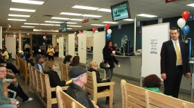  People waiting in line at the RMV at the Liberty Tree Mall in Danvers, Massachusetts.