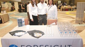 Foresight Construction Group employees attend a trade fair sponsored by the Central and North Florida Minority Supplier Development Council. From left to right, Melissa Segarra, marketing director, Juan Segarra, president and Maritza Rovira-Forino, minority business manager.