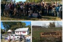 Dozens brought shovels and rakes to an Oct. 18 tree-planting event. The sign reads, "They tried to bury us. They didn't know we were seeds."