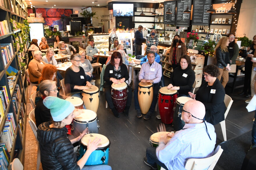 Sam Holmstock leads the Creative Exchange Meetup "Drumming Through Trauma" in Hyannis.