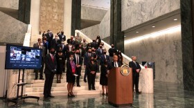 Assembly Speaker Carl Heastie and other democratic assembly members, at a news conference before voting on the package of bills to increase police accountability.