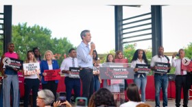Beto O'Rourke speaks to hundreds of demonstrators gathered for a rally in a park on the main University of Houston campus.