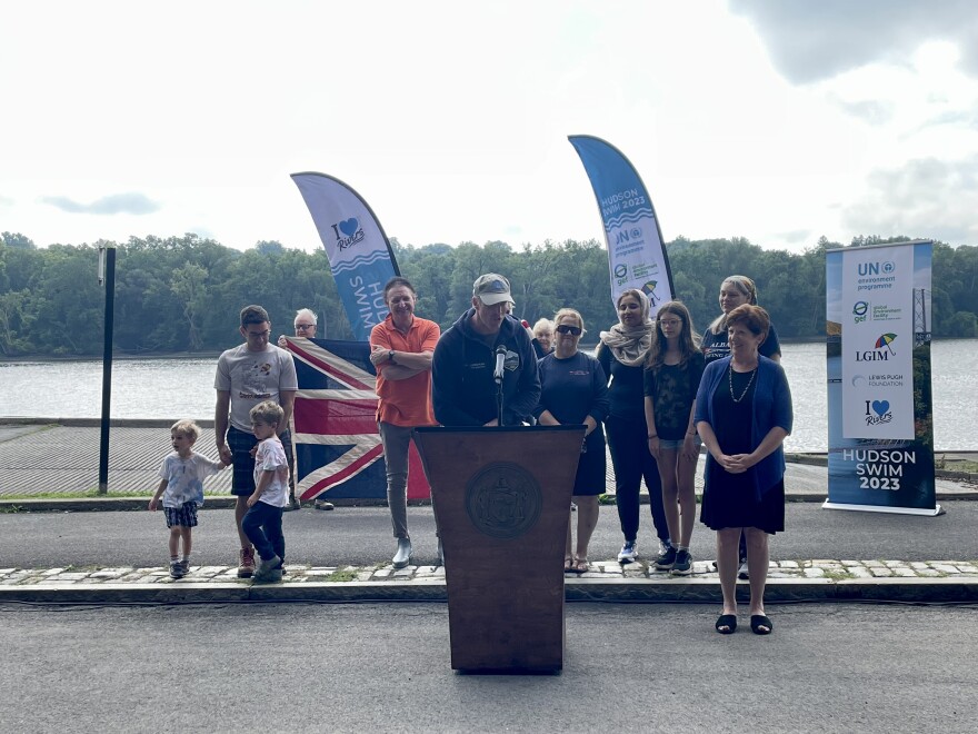 Lewis Pugh and Albany Mayor Kathy Sheehan discussing the importance of clean rivers as Pugh swims the entire length of the Hudson River