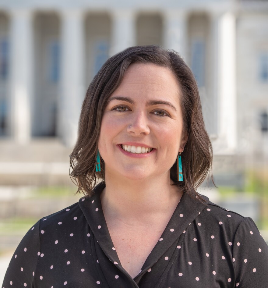 Portrait photo of Vermont Arts Council executive director Susan Evans McClure smiling outdoors