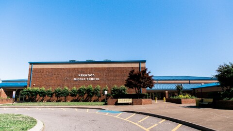 At least two Kenwood Middle School students died Friday after their school bus was involved in a collision in Carroll County with a TDOT dump truck and an SUV.