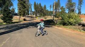 Jeremiah Cooper riding his bike recently in Paradise, Calif. (Courtesy of Andrea Cooper)