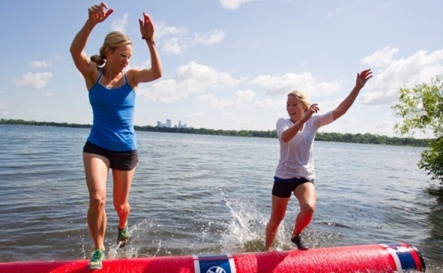 Lizzie Hoeschler Horvitz (left) rolling on a Key Log against Abby Hoeschler in 2014.