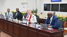 Pictured left to right: DLCA Director of Enforcement Wilbur Francis, DLCA Assistant Commissioner Horace Graham, USVI AG Gordon Rhea, DOH Commissioner Justa Encarnacion, DOH Director of Environmental Health Enforcement Wanson Harris