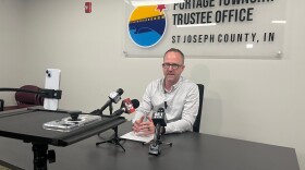 Portage Township Trustee Jason Critchlow on Tuesday talks with reporters about the need to spread the word that SNAP benefits might not be available Nov. 1 because of the federal government shutdown.