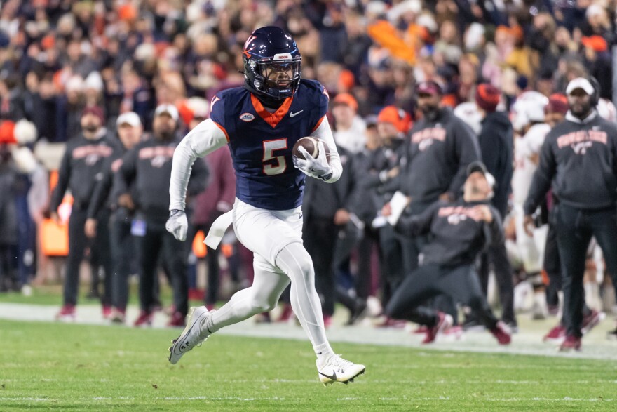 Virginia wide receiver Kameron Courtney (5) runs the ball downfield against Virginia Tech during the first half of an NCAA college football game, Saturday, Nov. 29, 2025, in Charlottesville, VA.