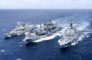 The Royal Canadian Navy Halifax-class frigate HMCS Regina, the Royal New Zealand Navy polar-class sustainment vessel HMNZS Aotearoa, and the Royal Australian Navy Hobart-class destroyer HMAS Sydney sail in company during the sea phase of Exercise Rim of the Pacific 2026 in the Pacific Ocean, July 12, 2026.