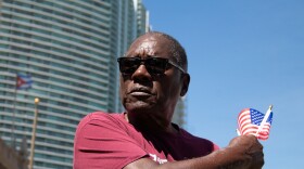 Community leader Dr. Marvin Dunn speaks at a protest outside of the Freedom Tower in downtown Miami Sept. 29, 2025.