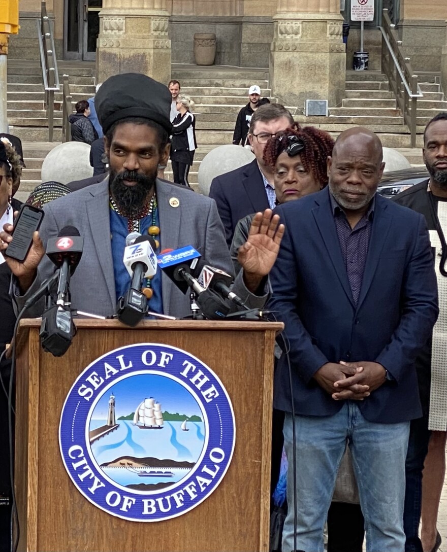 Juneteenth Executive Vice President Ras Jomo Okono delivers remarks during the raising of the Pan-African Liberation Flag in Niagara Square