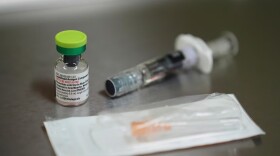 FILE - A vial of the measles, mumps and rubella (MMR) vaccine is pictured at International Community Health Services, Wednesday, Sept. 10, 2025, in Seattle.