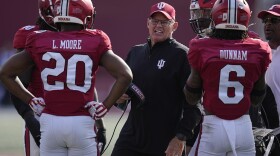 Indiana head coach Tom Allen talks with the defense during the second half of an NCAA college football game against Wisconsin, Saturday, Nov. 4, 2023, in Bloomington, Ind.