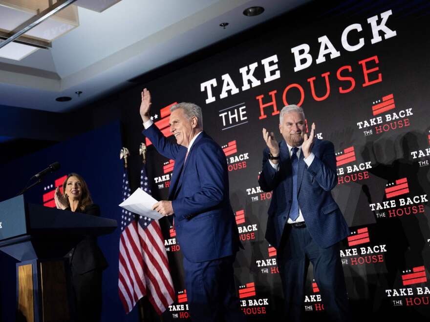 Rep. Tom Emmer claps as House Republican Leader Kevin McCarthy arrives to speak at a watch party after the midterm elections.