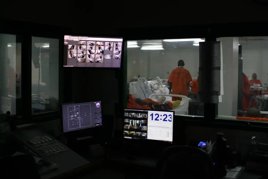 Inmates are monitored at a security station at the Harris County Detention Center on April 16, 2024, in Houston.