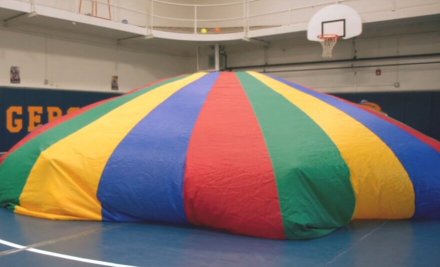 large, colorful gym parachute
