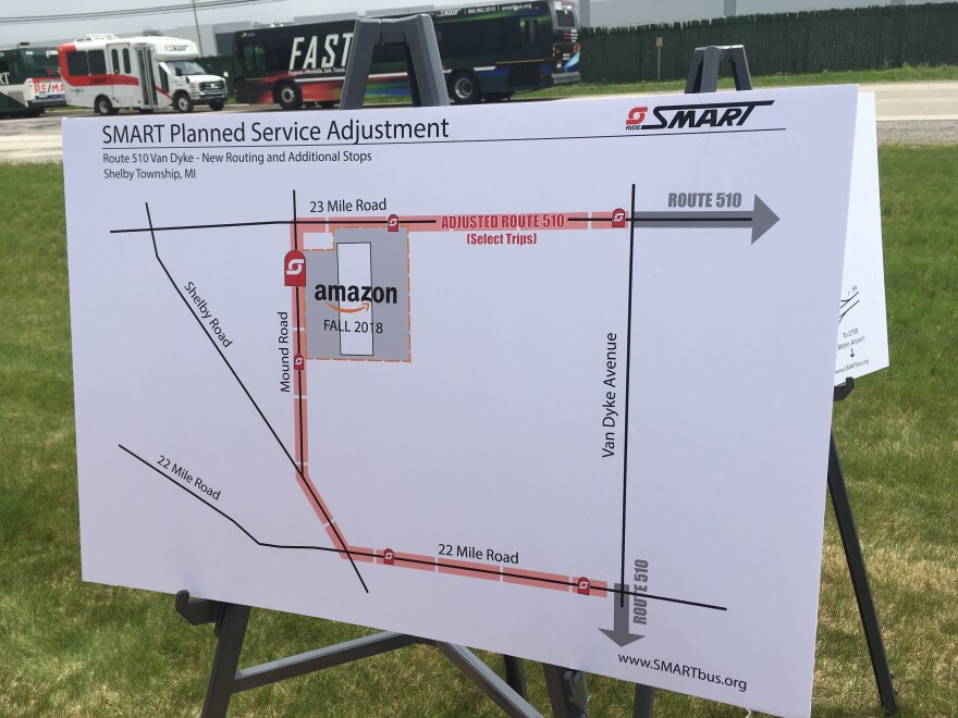 A poster shows how an adjusted SMART route will serve an Amazon warehouse in Shelby Township starting in September.