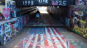 UF’s Norman Hall Tunnel has become a canvas for free expression and a battleground for clashing political views, with messages constantly being painted over and replaced. (Emma Tufano/WUFT)