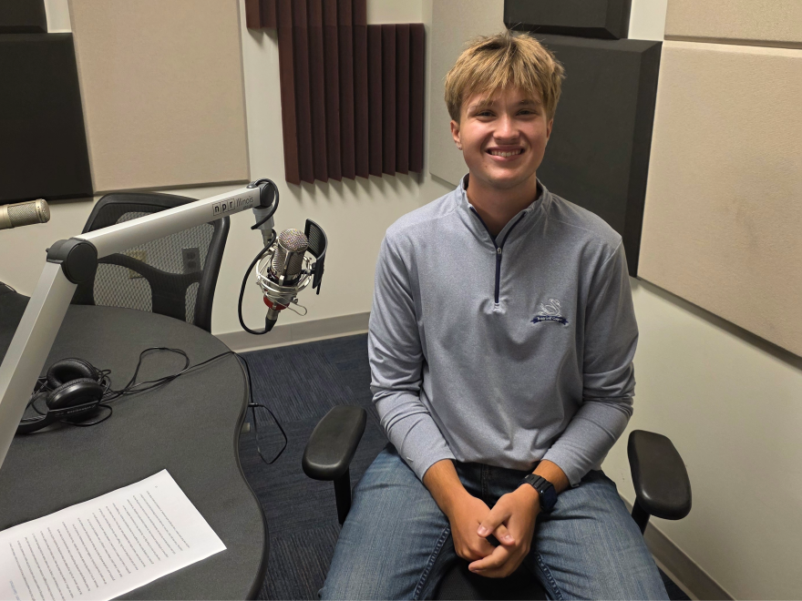 Gavin Kornack at the mic in NPR Illinois Studio F.