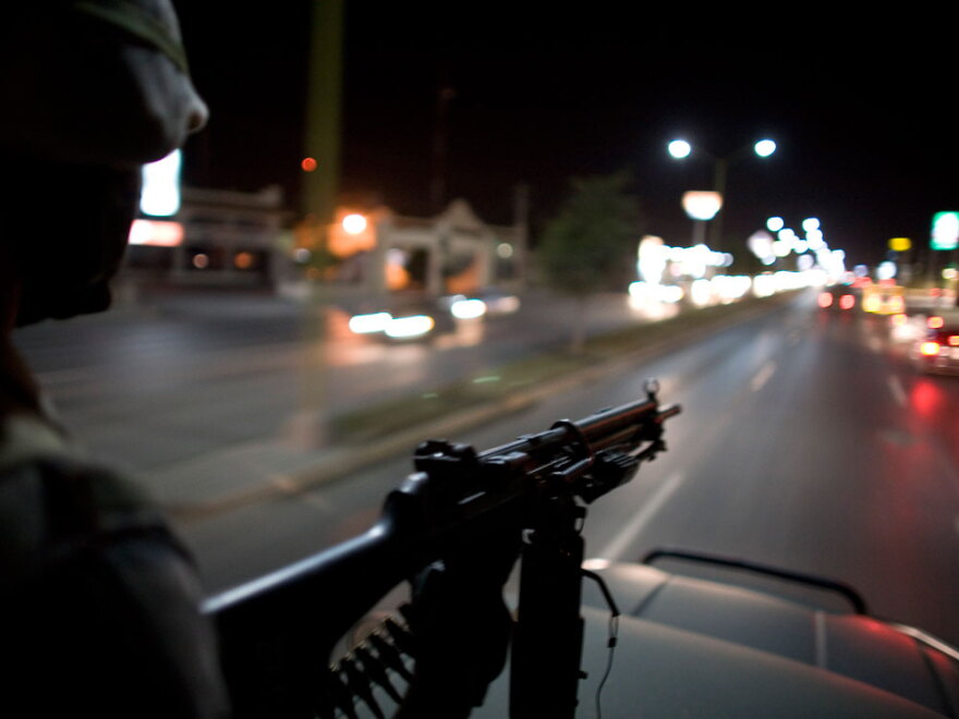 Mexican soldiers patrol the streets of Reynosa, on Mexico's northeastern border with the United  States, in March 2009.