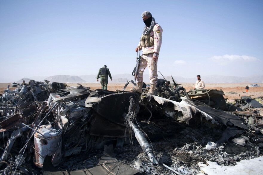 An Iranian soldier stands amidst the wreckage of a U.S. aircraft that crashed in area near Isfahan, Iran on Monday, April 6, 2026.Iran's Revolutionary Guards said a US aircraft that had been searching for the crew member of a missing US fighter jet had been destroyed, Iranian media reported. US President Donald Trump said earlier that the second crew member from the American fighter jet that crashed inside Iran was SAFE following a search and rescue operation. Photo by Behnam Tofighi/UPI