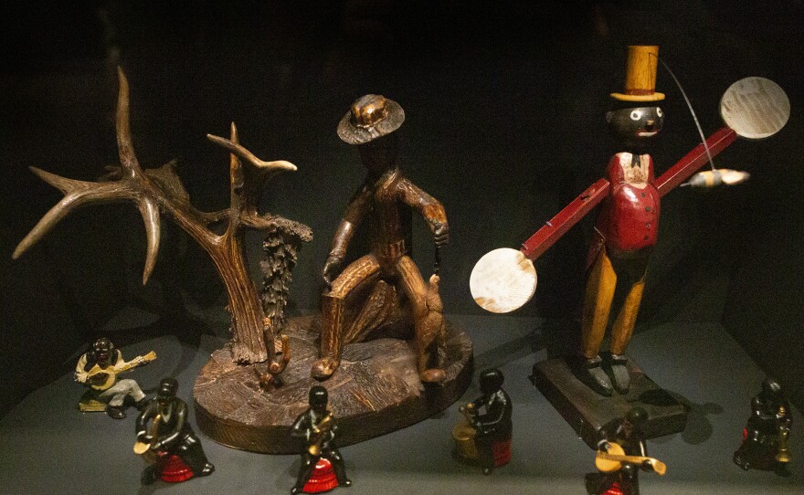Objects and figurines perpetuated caricatures of African-Americans through small, ordinary household displays — many at the expense of exaggerating an "entertainer" persona and facial features.