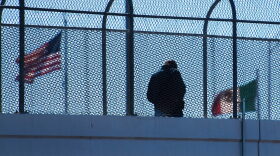A man crosses the footbridge to Juarez, Mexico, from El Paso, Texas, on Feb. 20, 2017. (Jim Watson/AFP/Getty Images)