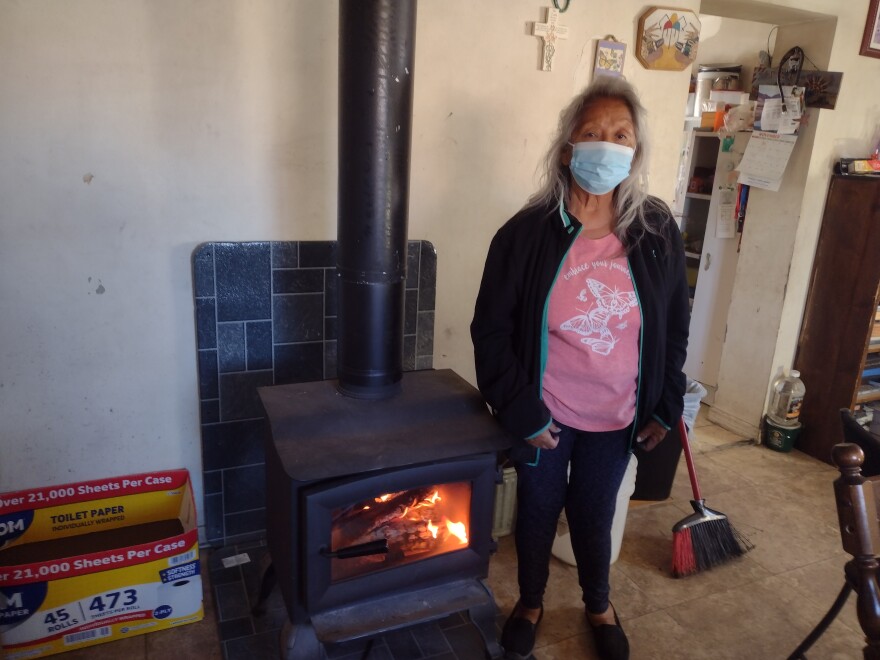 Patricia Selestewa heats her home in Hotevilla with a wood-burning stove.