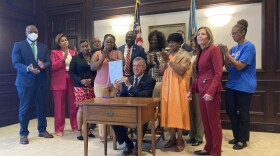 Gov. Carney signs HB 375 establishing the Racial Equity Consortium at Delaware State University.