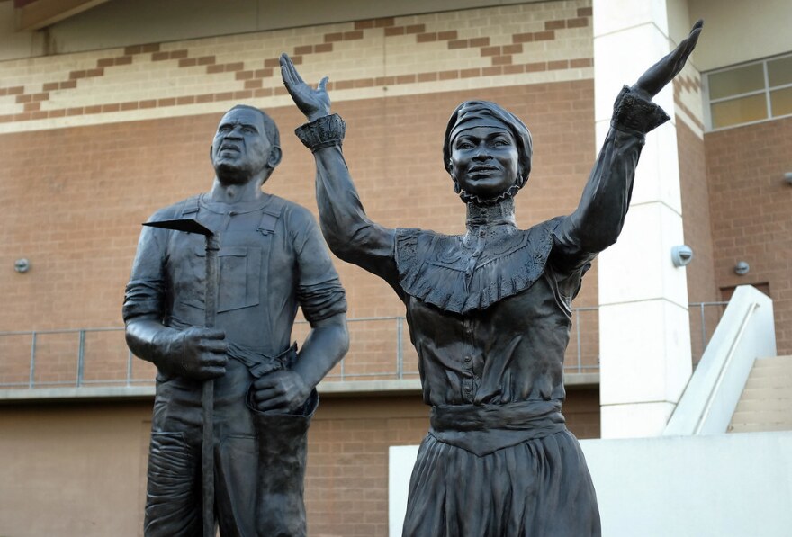 Statues from the Juneteenth memorial at the George Washington Carver Museum. 