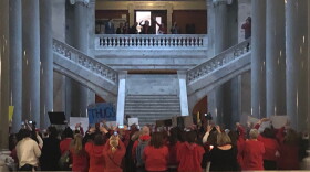 Kentucky teachers cram into the second floor landing outside the House of Representatives on day 26 of the 30-day session on March 7, 2019. 