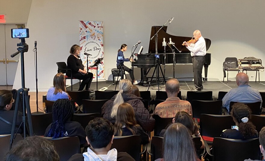 Violinist Joseph Genualdi and pianist Jihyun Oh begin their performance to students and community members at the Lied Pavilion during KPR's Live Day daytime concerts.