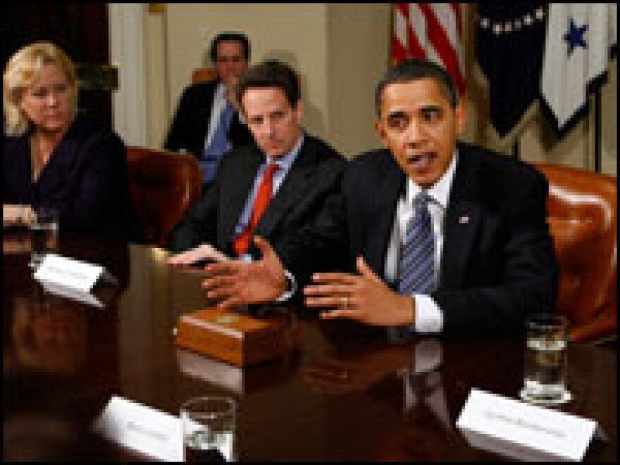 From left: Sen. Mary Landrieu (D-LA), Treasury Secretary Timothy Geithner and President Obama meet with members of Congress and small-business leaders at the White House Monday.  The president announced that he has asked Geithner to use all legal tools to block executives at AIG from receiving bonuses.