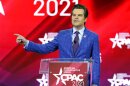 Matt Gaetz speaks in front of a podium at the Conservative Political Action Conference.