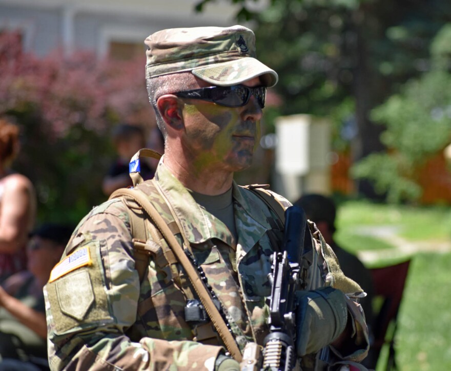 A soldier participates in Plattsburgh's 2018 Fourth of July parade