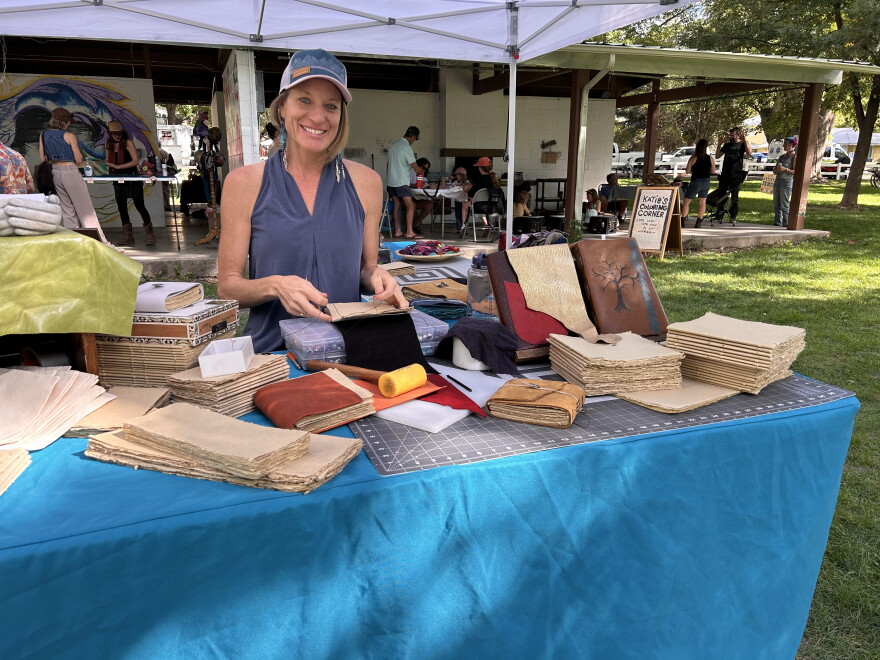 Bookbinder Laura Zick in her booth at the Mountain Harvest Festival in Paonia.