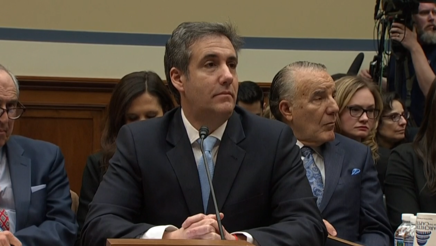 Michael Cohen testifying before the House oversight committee Wednesday.