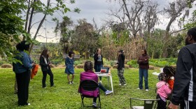 Attendees gather in a circle to discuss the tool and the issue of gentrification in general. The discussion was an open forum for everyone to share their thoughts. (Hannah Getman/WUFT News)