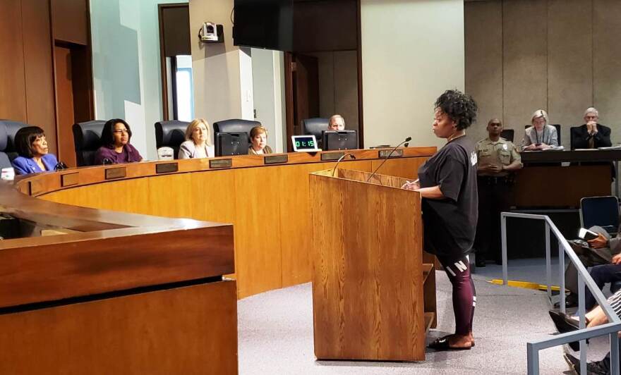 Tashonda Troupe, whose son Lamar Catchings died in the St. Louis County jail in March, addresses the St. Louis County Council on Tuesday. Troupe said she was disappointed that the former head of the jail would remain employed by the county.