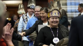 Clarissa Sabattis, Chief of the Houlton Band of Maliseets, foreground, and other leaders of Maine's tribes are welcomed by lawmakers into the House Chamber, Wednesday, March 16, 2023, at the State House in Augusta, Maine.