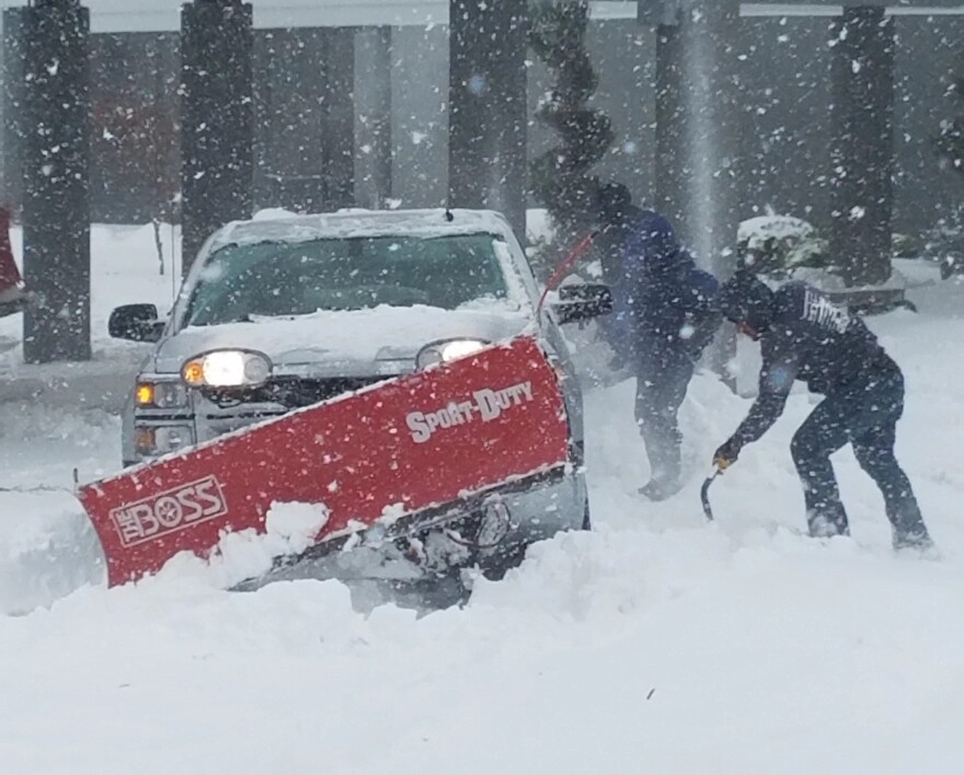 A plow truck gets stuck in snow in Winston-Salem in 2018