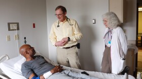 Dr. Robert Frenck, center, doing clincal rounds pre-coronavirus.