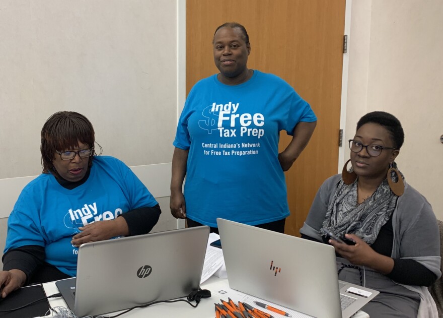 Workers get ready to help people get signed up for Indy Free Tax Prep.