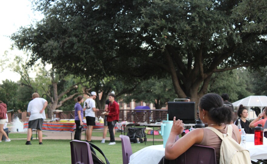 Students enjoying the event outside before the storms.