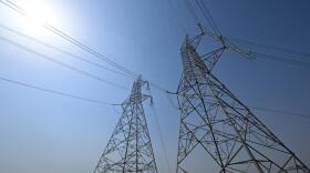 Overhead electric power cables. (Fethi Belaid/AFP via Getty Images)