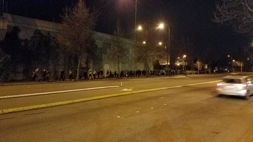 Pro-immigrant protesters forced off light rail walk the last 2 miles to their destination, Sea-Tac Airport, on Saturday.